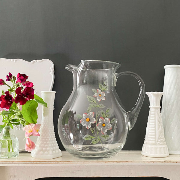 http://shopinthevintagekitchen.com/cdn/shop/files/vintage-handblown-glass-pitcher-made-in-turkey_1_grande.jpg?v=1695478488