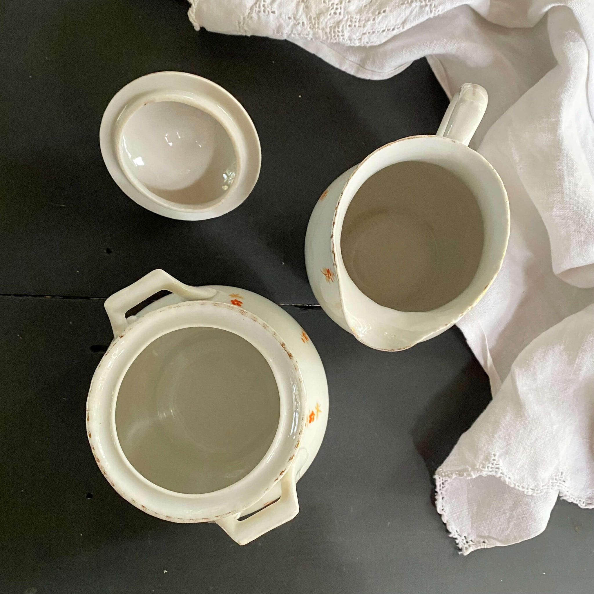 Antique Porcelain Cream and Sugar Set with Handpainted Orange Flower Buds