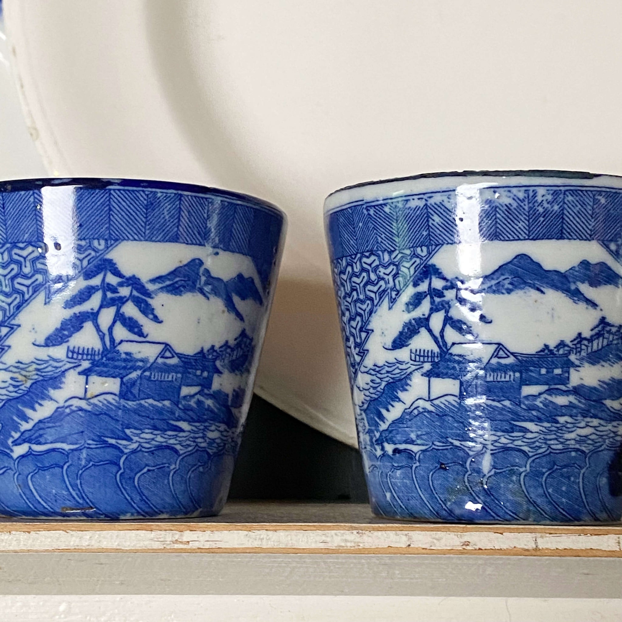 Small Antique Blue and White Japanese Porcelain Cups with Mountain Scenes - Set of Two