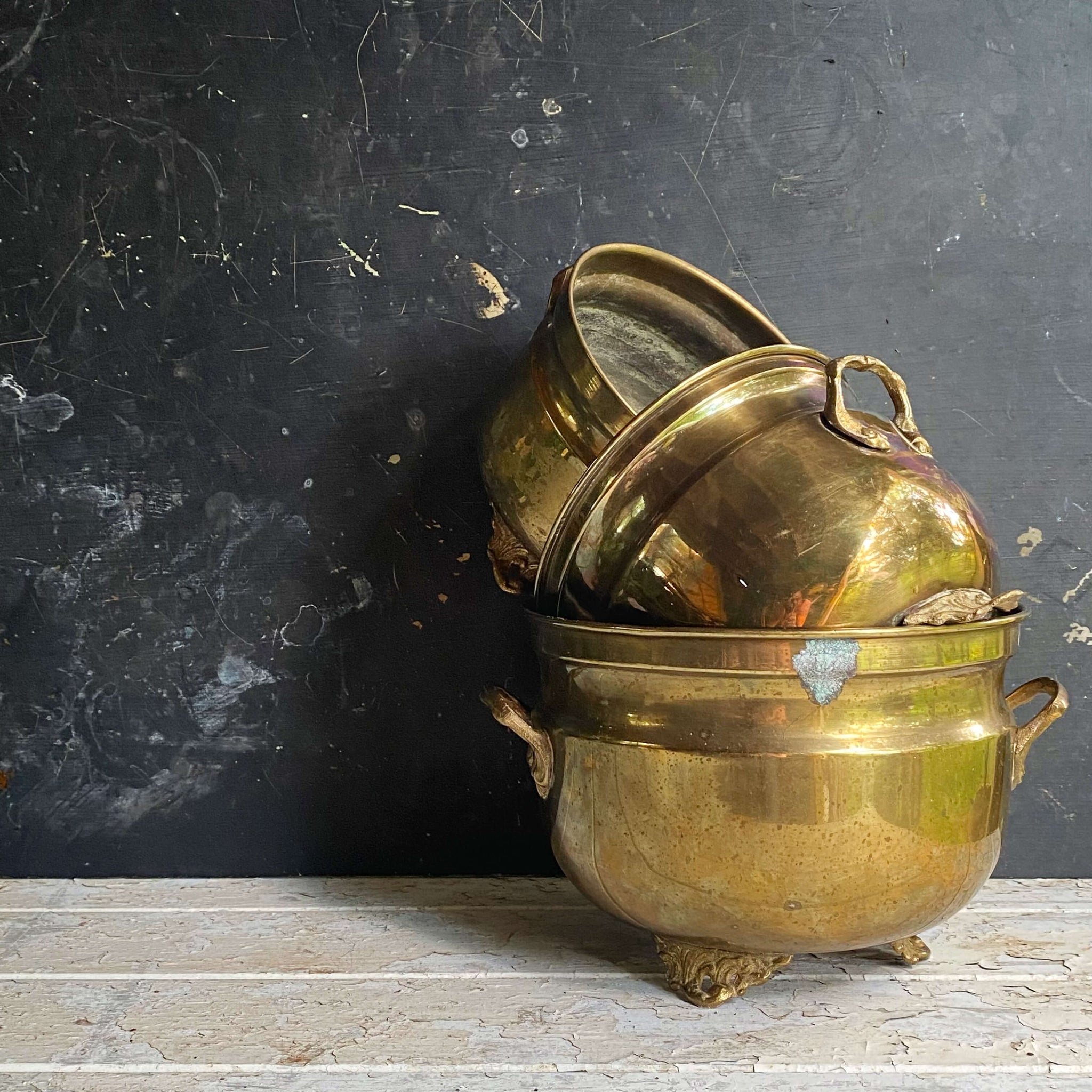 brass plant pot holder Vintage Footed Brass Plant Holders - Set of Three