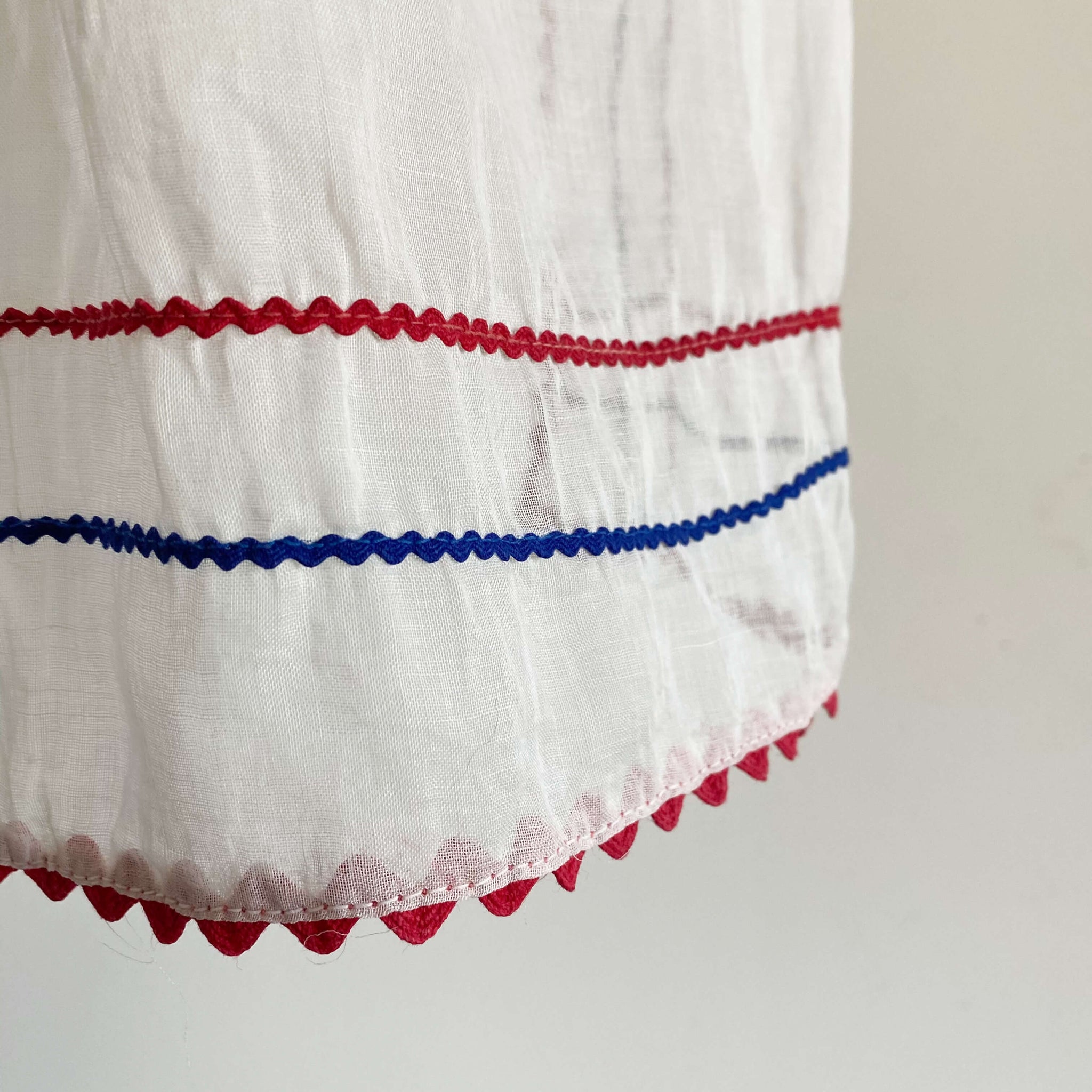 Vintage Sheer Half Apron with Red and Blue Ric Rac Stripes circa 1940s
