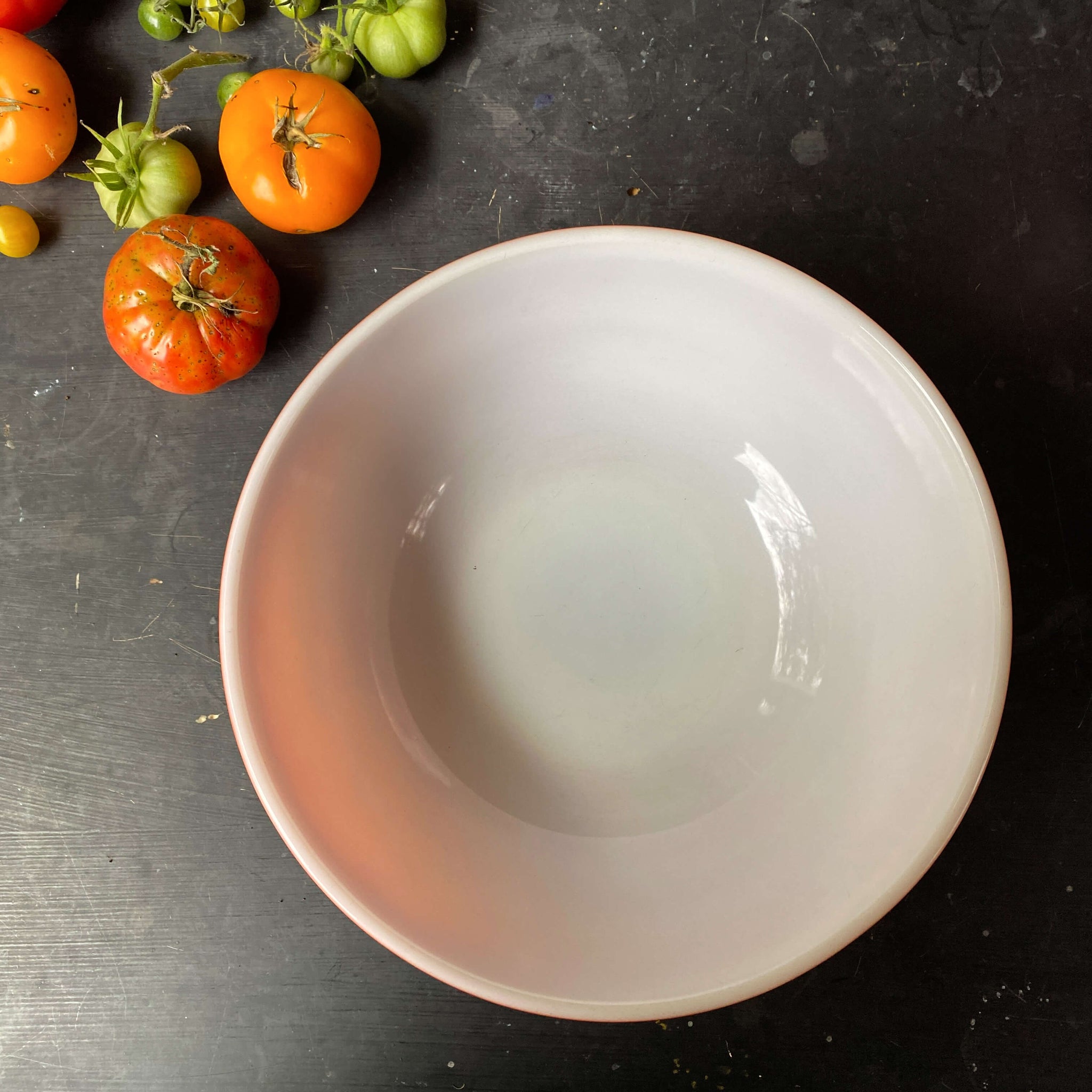 https://shopinthevintagekitchen.com/cdn/shop/products/vinatge-orange-white-mixing-bowl-bowl_1_2048x2048.jpg?v=1698086362