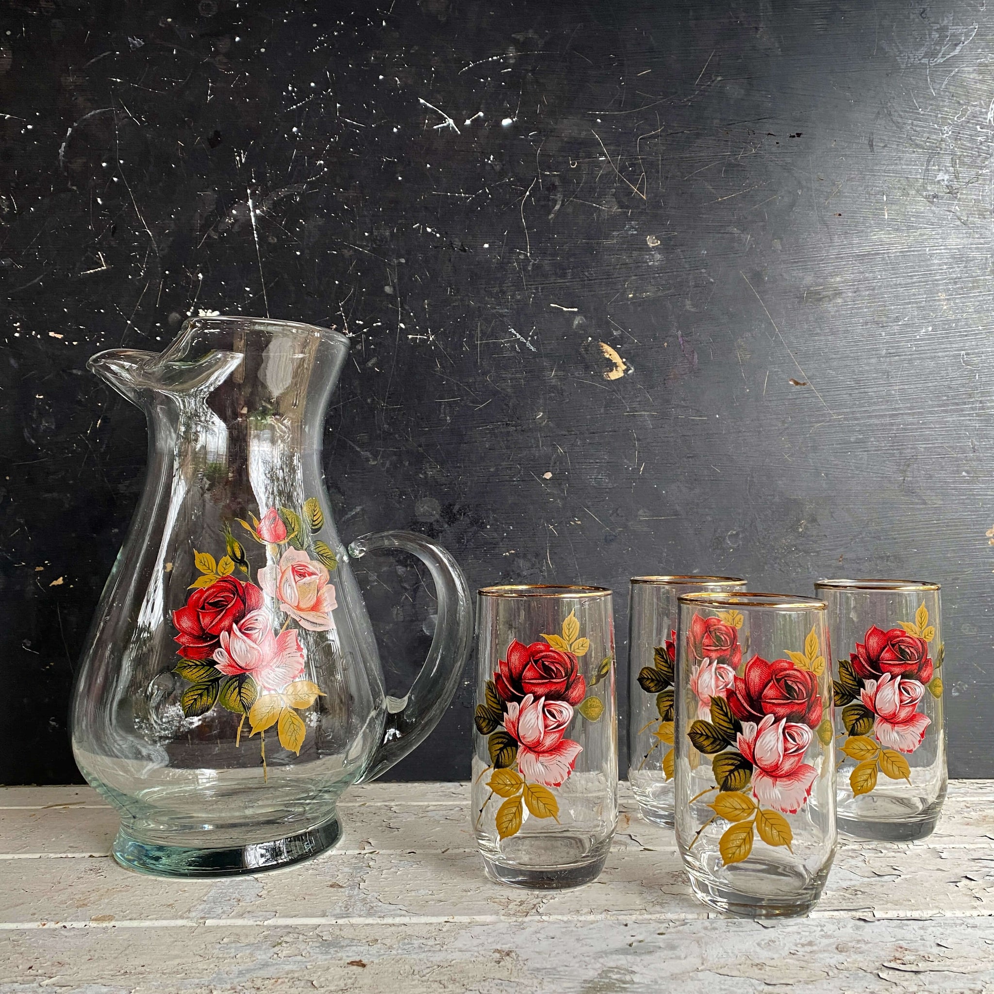 https://shopinthevintagekitchen.com/cdn/shop/products/vintage-rose-floral-barware-pitcher-tumbler-set-west-virginia-glass_1_2048x2048.jpg?v=1680910056